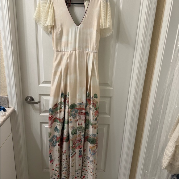 Antix Dresses & Skirts - Chic Cream Maxi Dress with Vibrant Print